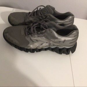 Mens size 13 Reebok Zig Tech Shark shoes. Grey, Silver and Black.
